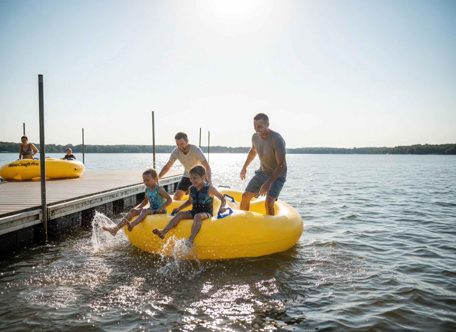 WaveCraft inflatable tubes prepared beside a family dock